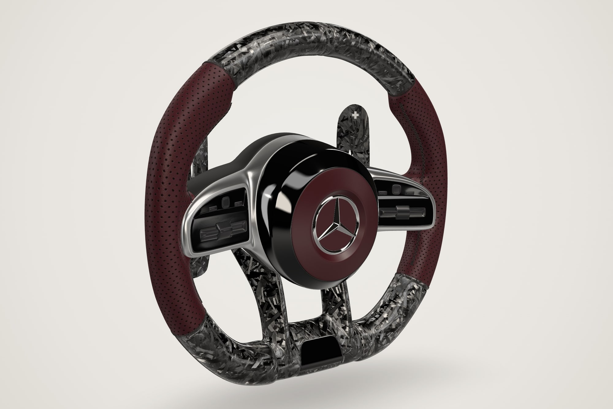 AMG Performance wheel in burgundy perforated Nappa with gloss forged carbon and long carbon paddles