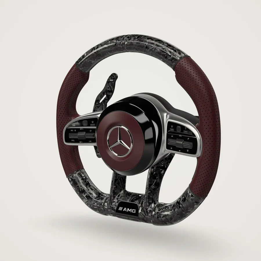 Mercedes-AMG Performance steering wheel in burgundy perforated Nappa and forged carbon, three-quarter view
